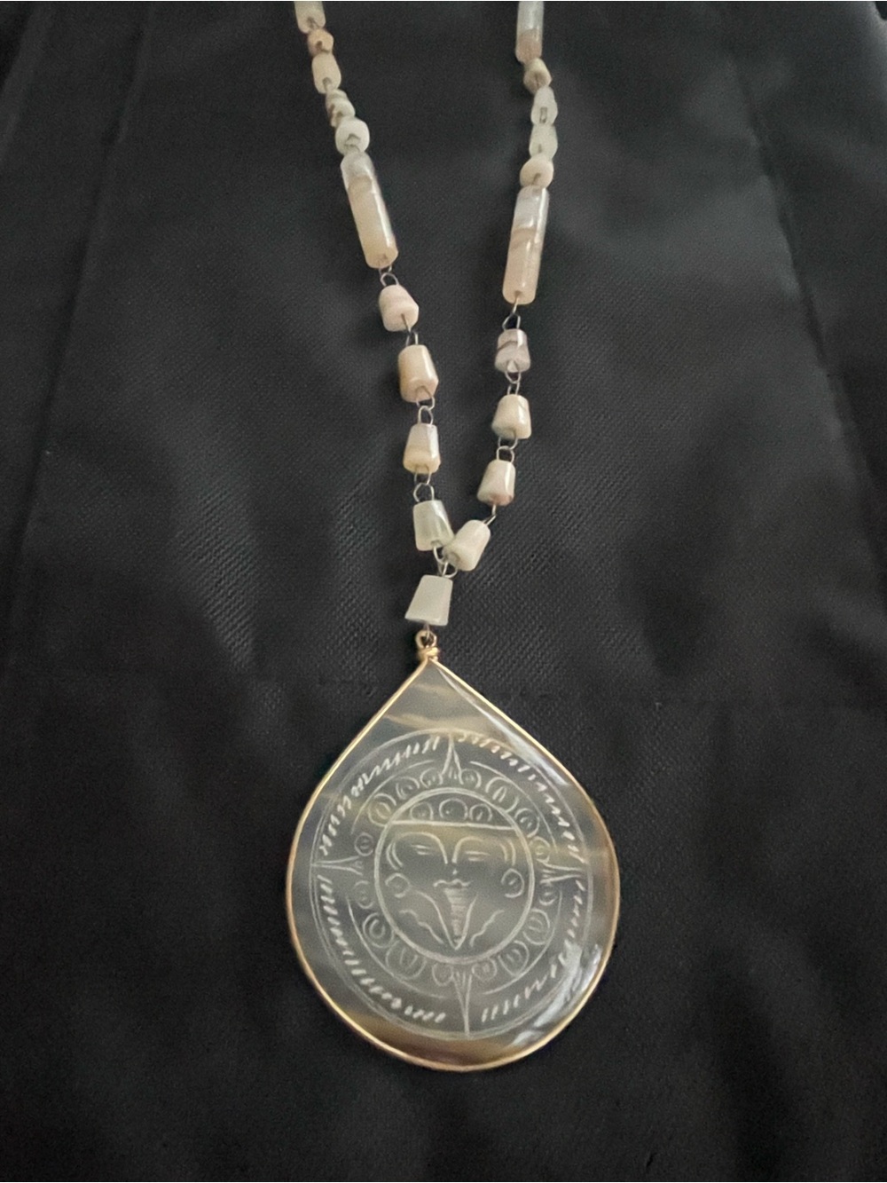 Carved Cream Teardrop Pendant Necklace with Gold Trim